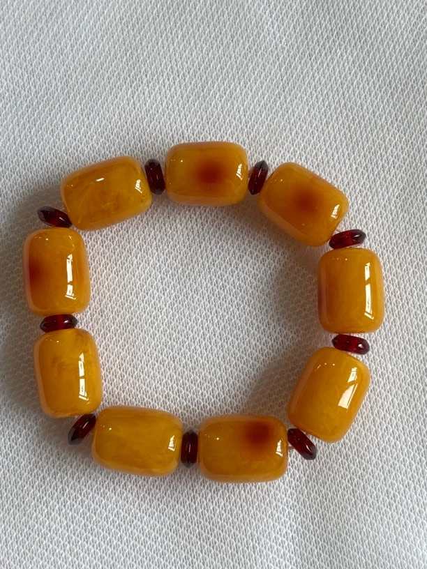 A11蜜蜡桶珠带红圆片珠单圈