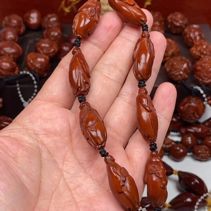 橄榄核吊坠苏**家8877666554