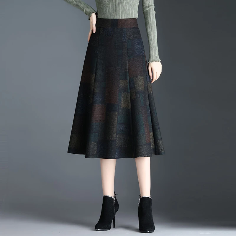 秋冬2025新款亮闪闪A字格子半身裙胯骨宽的裙子格纹半裙毛呢长裙