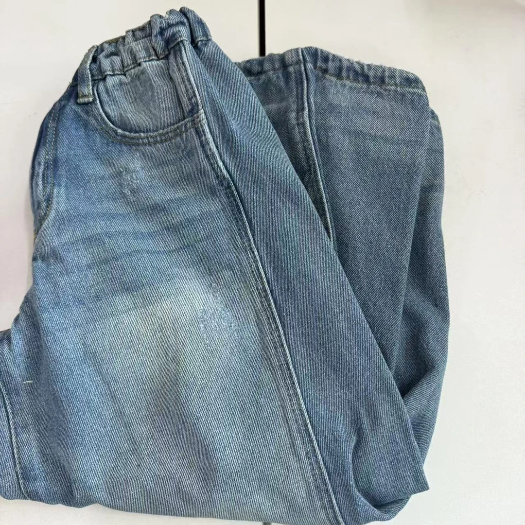 儿童蓝色大弯刀牛仔裤秋季