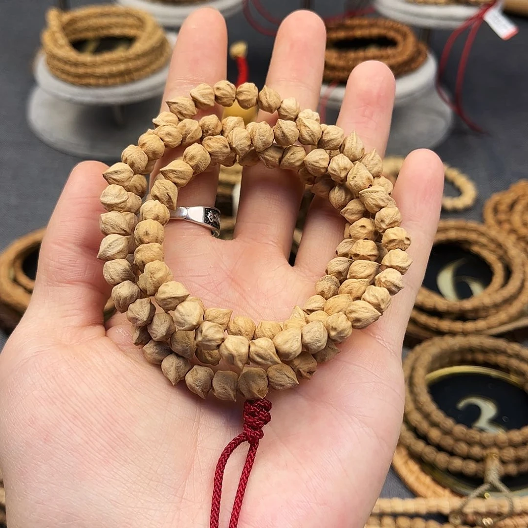 柏香籽/百香籽吊坠胖****鱼