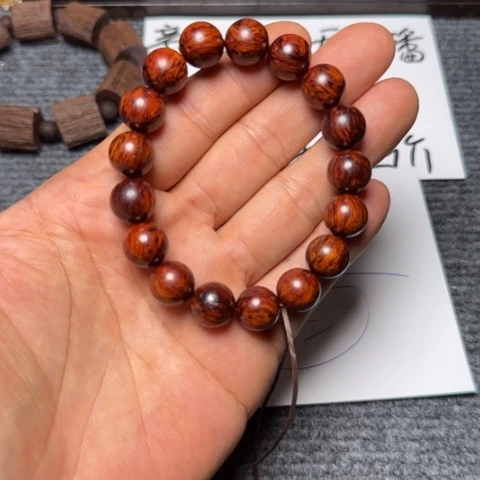藤类海南红降1.2瑕疵圆珠手串