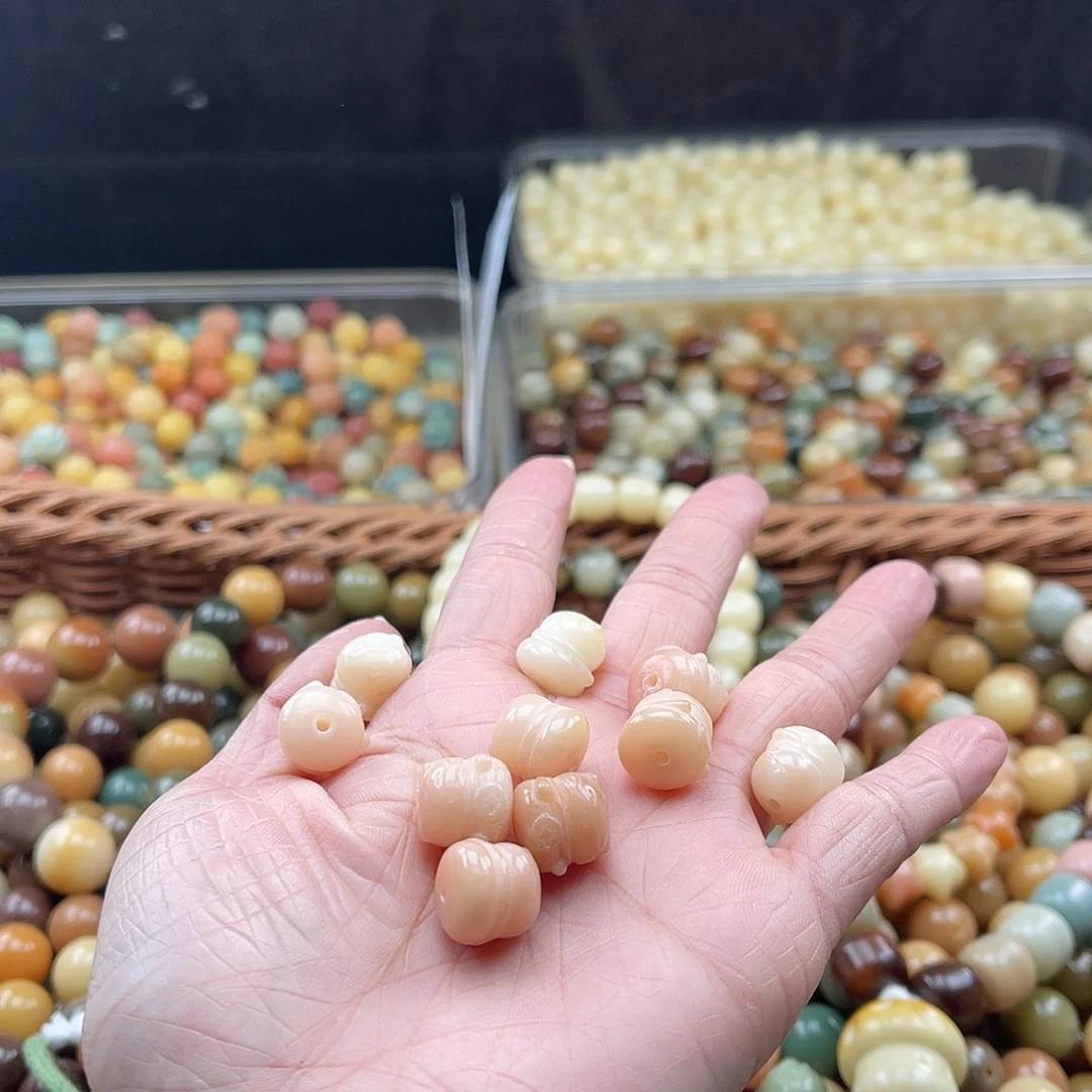 白玉菩提吊坠Z/12mm/5+5颗微瑕
