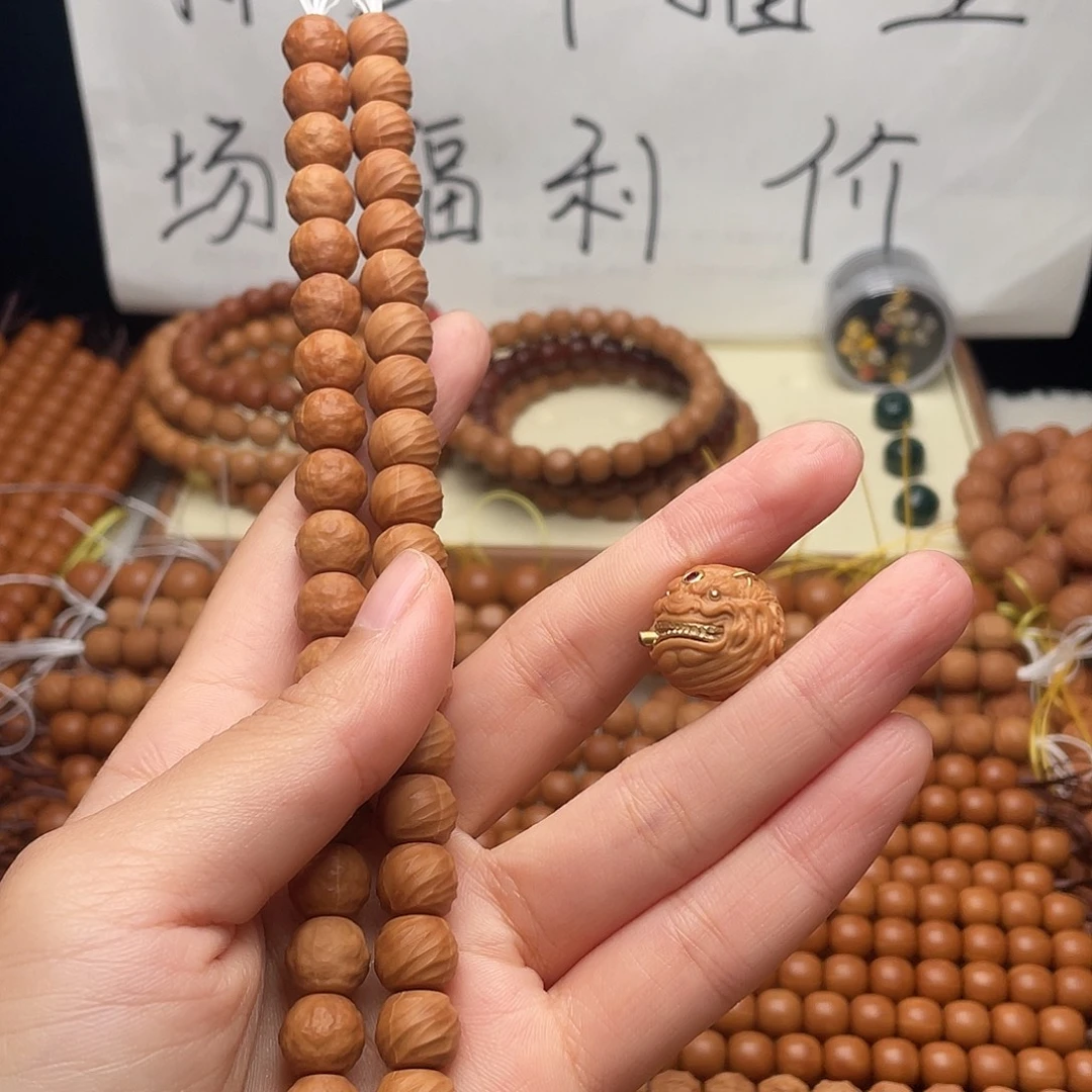 鹏***鹏猴头核桃手串全品舍利 手工云锦