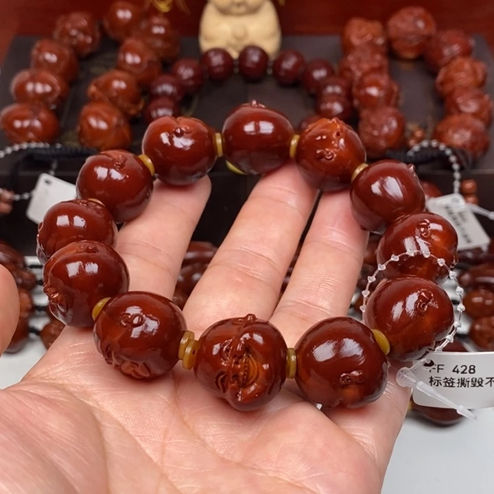 橄榄核吊坠9887776655