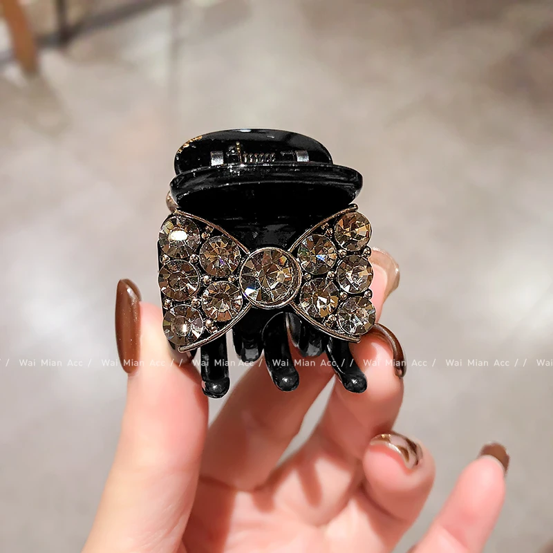 轻奢时尚镶钻蝴蝶结抓夹女高端黑色高马尾夹固定神器新款半扎发夹