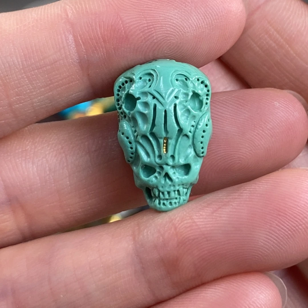 未镶嵌绿松石。异型三通