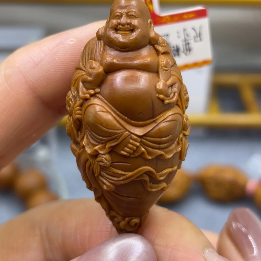 橄榄核吊坠聚宝弥勒