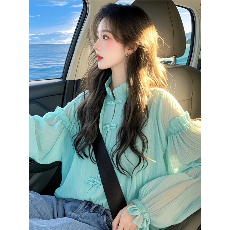 2025年春季新款时尚气质韩系别致宽松绿色长袖衬衫上衣设计感小众