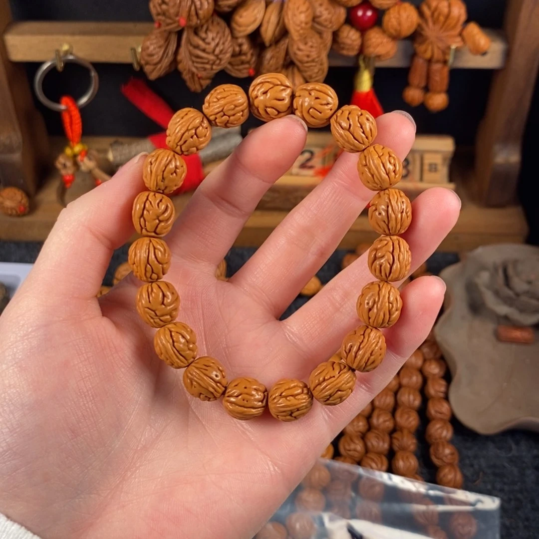 吊坠桃核?****?桃枭手串