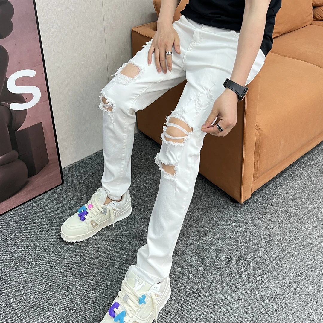 夏季新款男裤爆款白色个性潮流大破洞休闲韩版高弹修身小脚牛仔裤