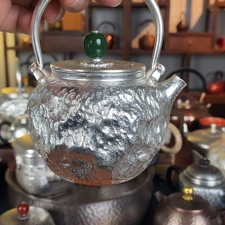 佬***渔手工制作紫铜壶工艺