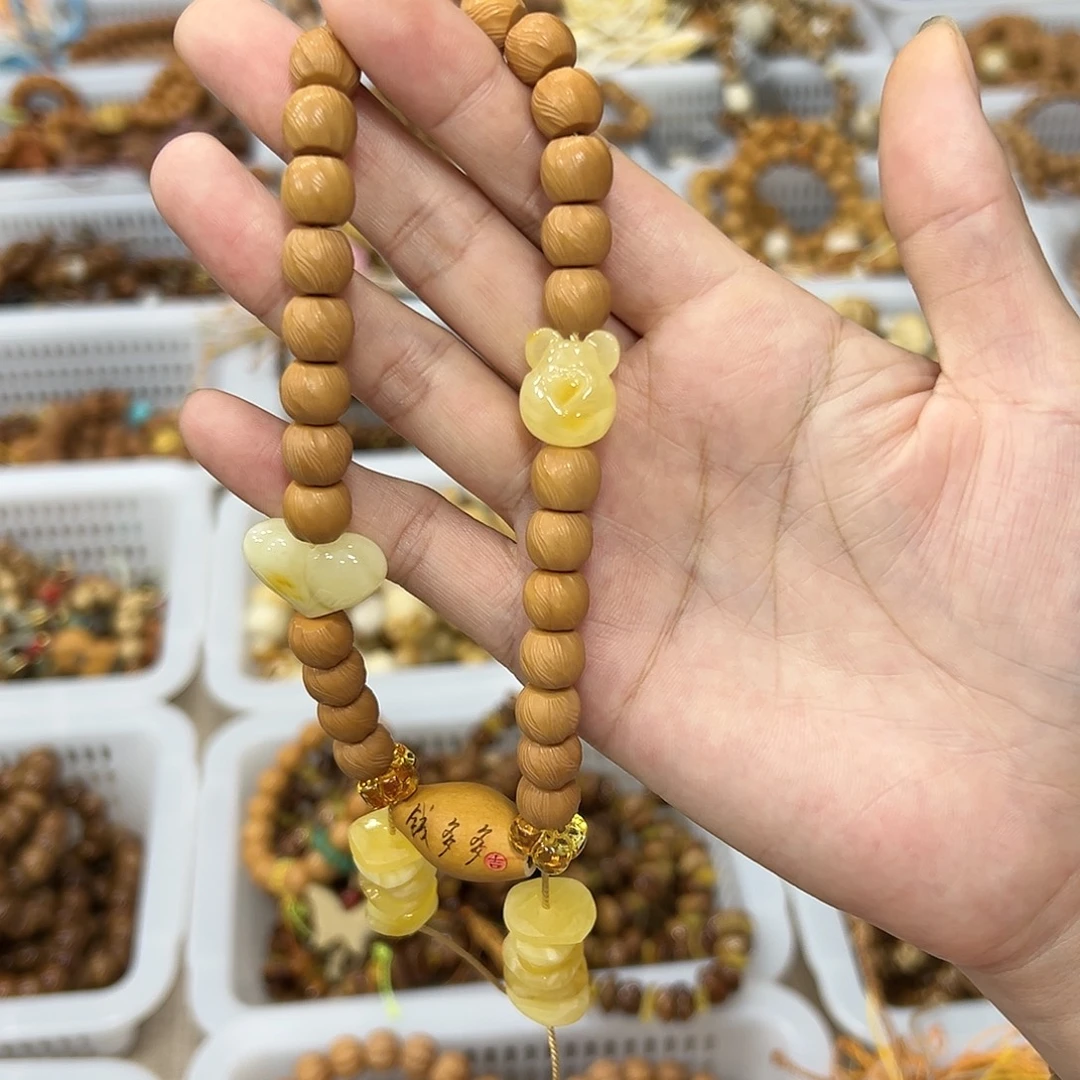 吊坠猴头核桃云锦手持