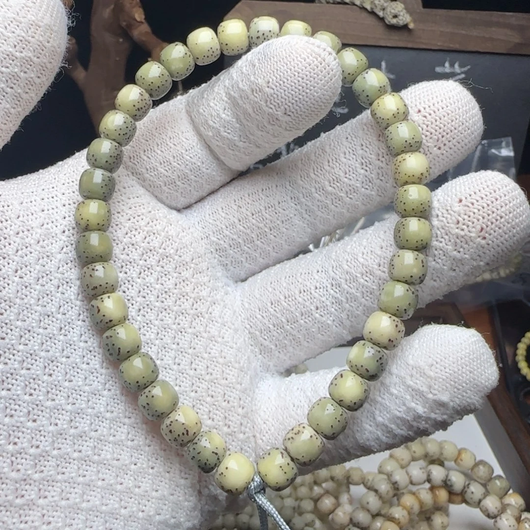 星月菩提手串7.5玉化河豚手持