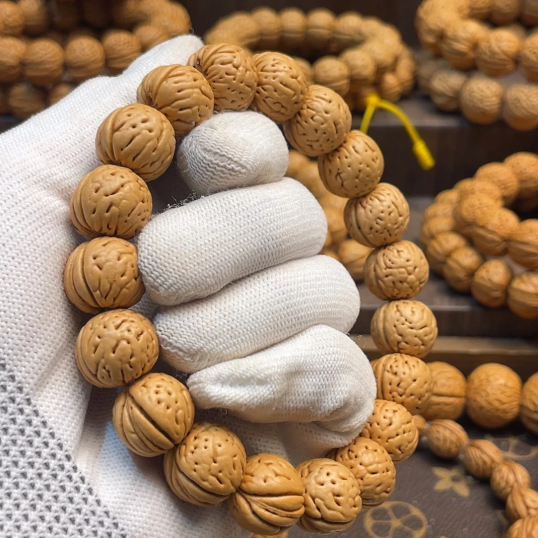 吊坠桃核超**子金丹手串