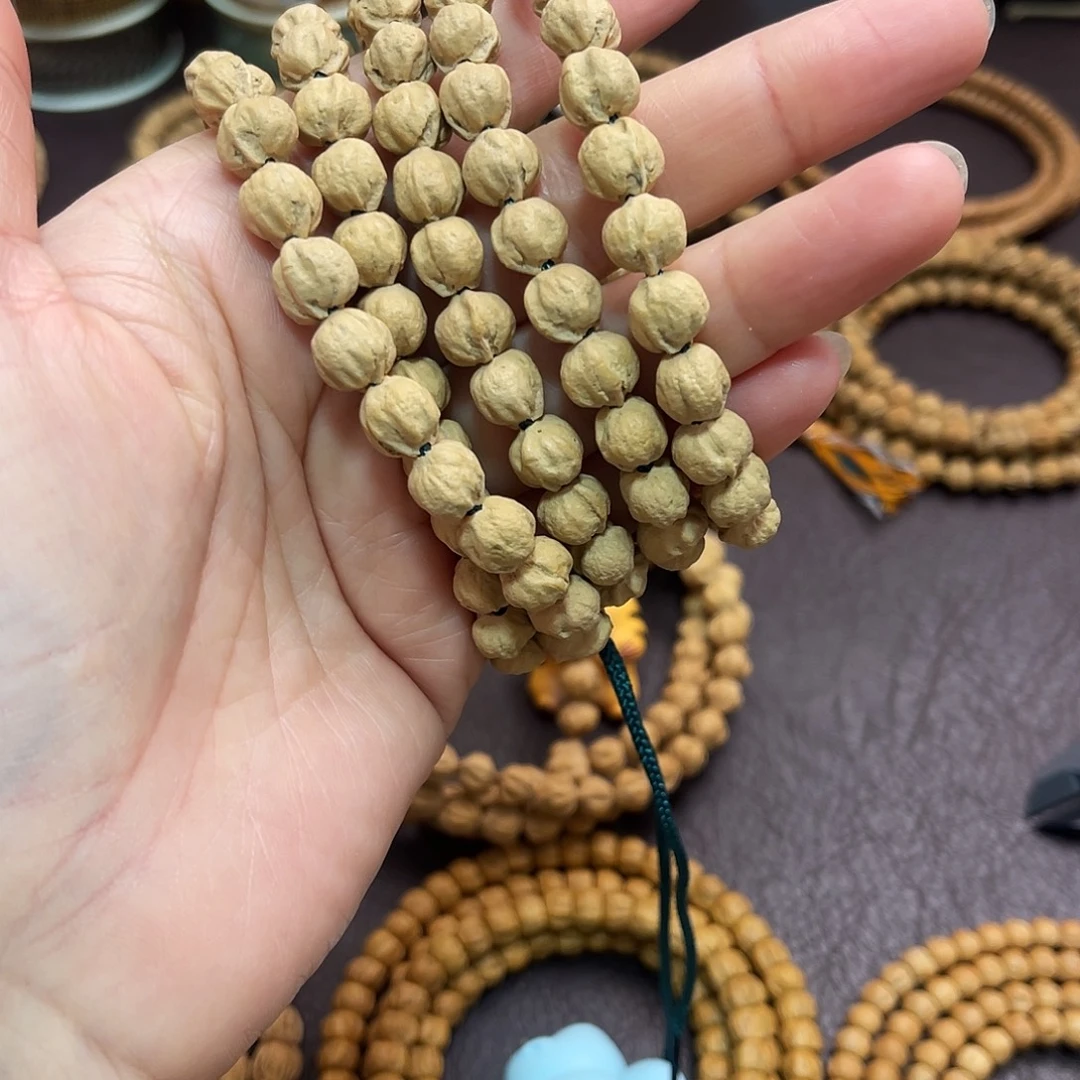 兆***金柏香籽/百香籽吊坠