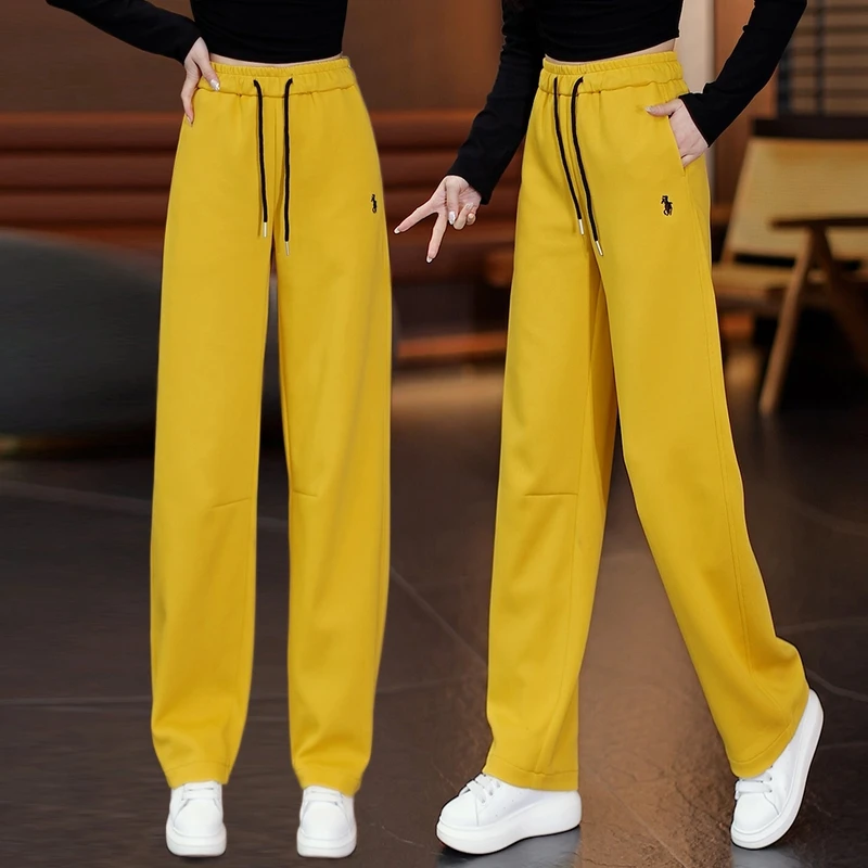黄色运动弯刀裤女春夏2025新款松紧腰百搭休闲裤直筒香蕉卫裤