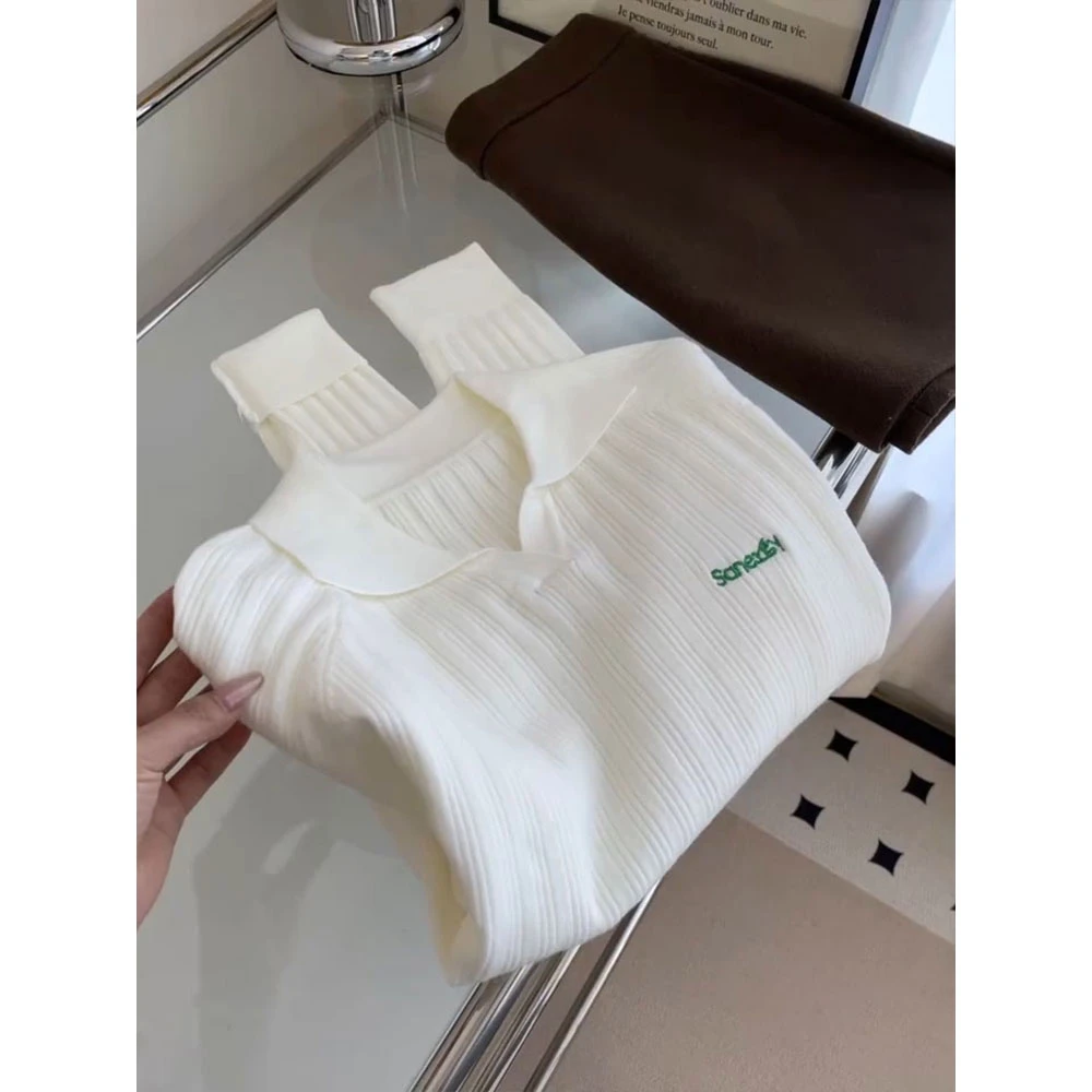 温柔甜美奶白色polo领针织衫女早秋小众刺绣长袖上衣薄款打底毛衣