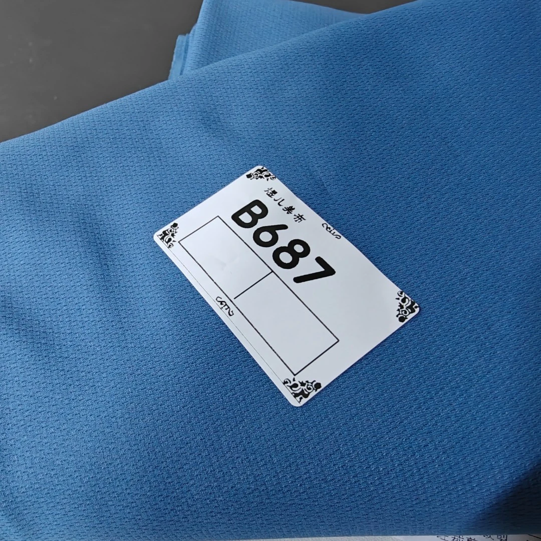 687灰蓝海藻雀眼布料