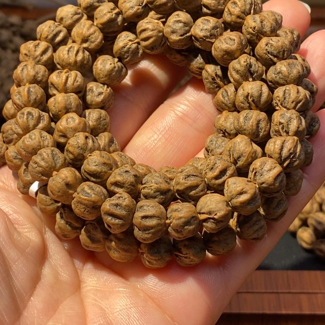 罗***波吊坠柏香籽/百香籽