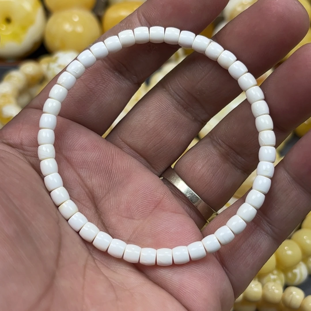 琥珀未镶嵌手串油漆白直切手串4.5mm
