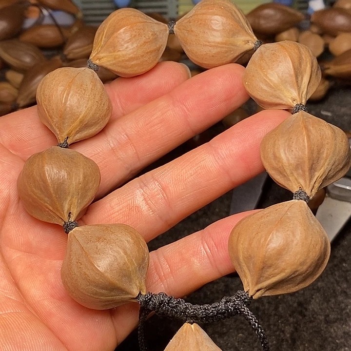 橄榄核吊坠2.5四花38