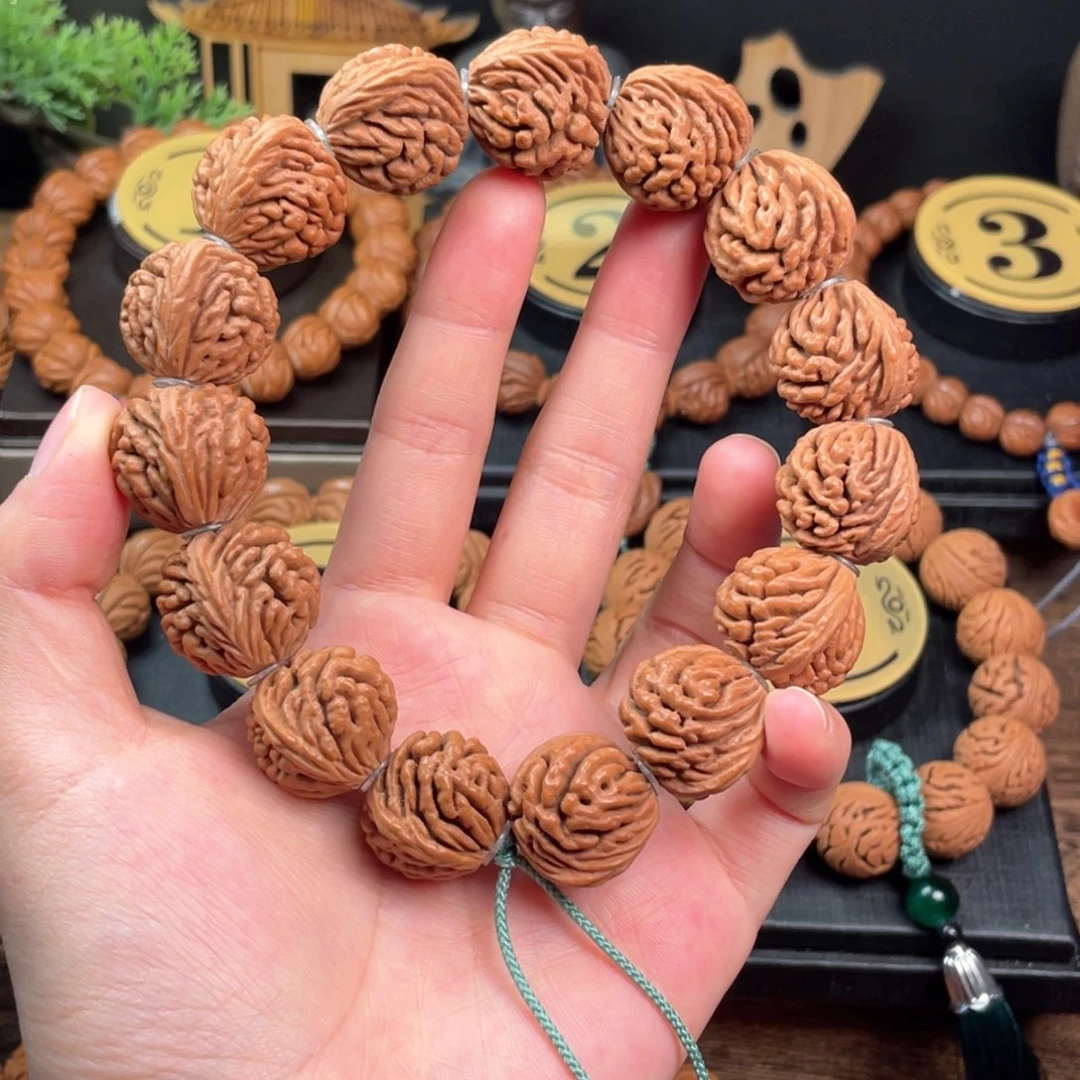 吊坠桃核刺龙纹21编织绳