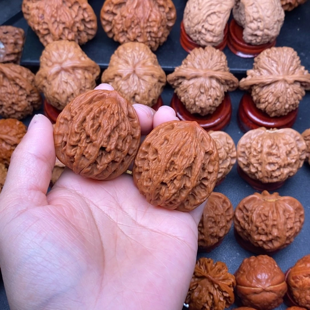 -***眸文玩核桃把件虎头