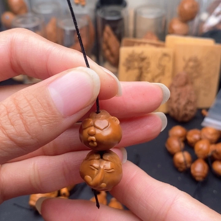 目****吊坠橄榄核表情包2