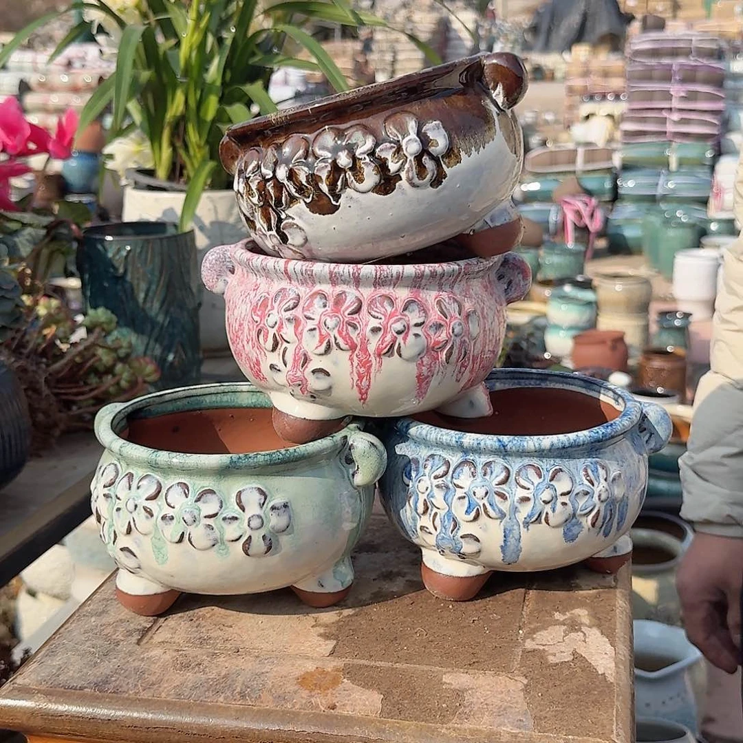 紫砂花盆口15高10（四个花花俊子