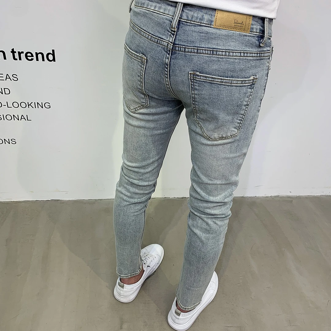 浅蓝色九分牛仔裤男2025新款潮流修身弹力小脚韩版抓痕显瘦长裤