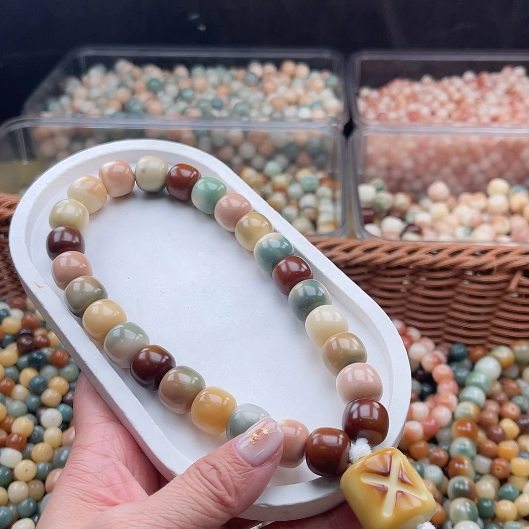 白玉菩提吊坠陌****?A/14mm/1条手持