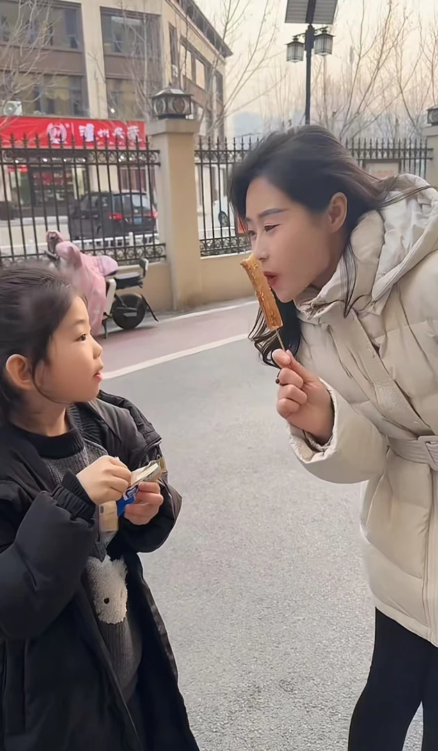 霍梦雪  羽绒服 A  奶灰色 83007