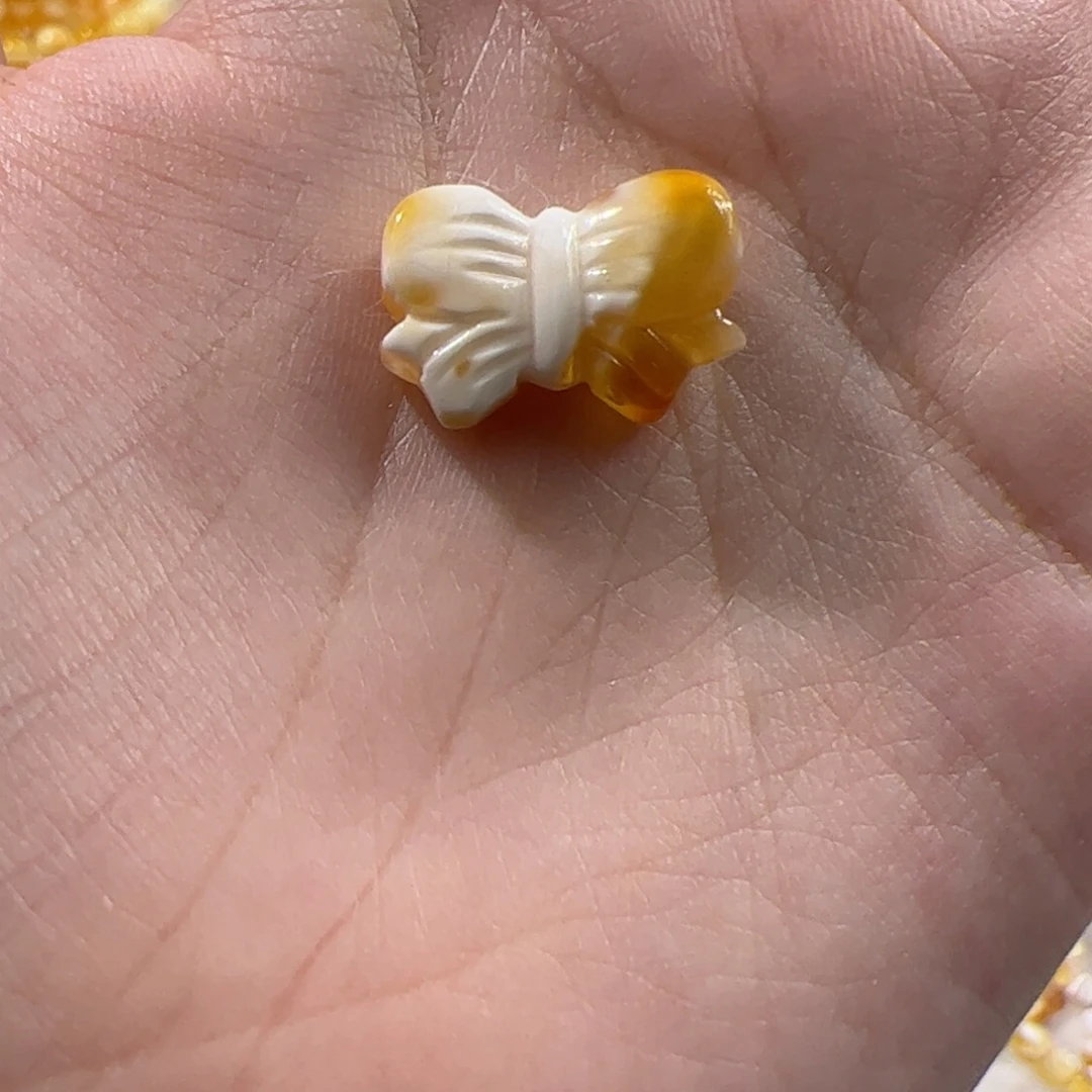 琥珀未镶嵌珠宝奇石金瓷白蝴蝶结