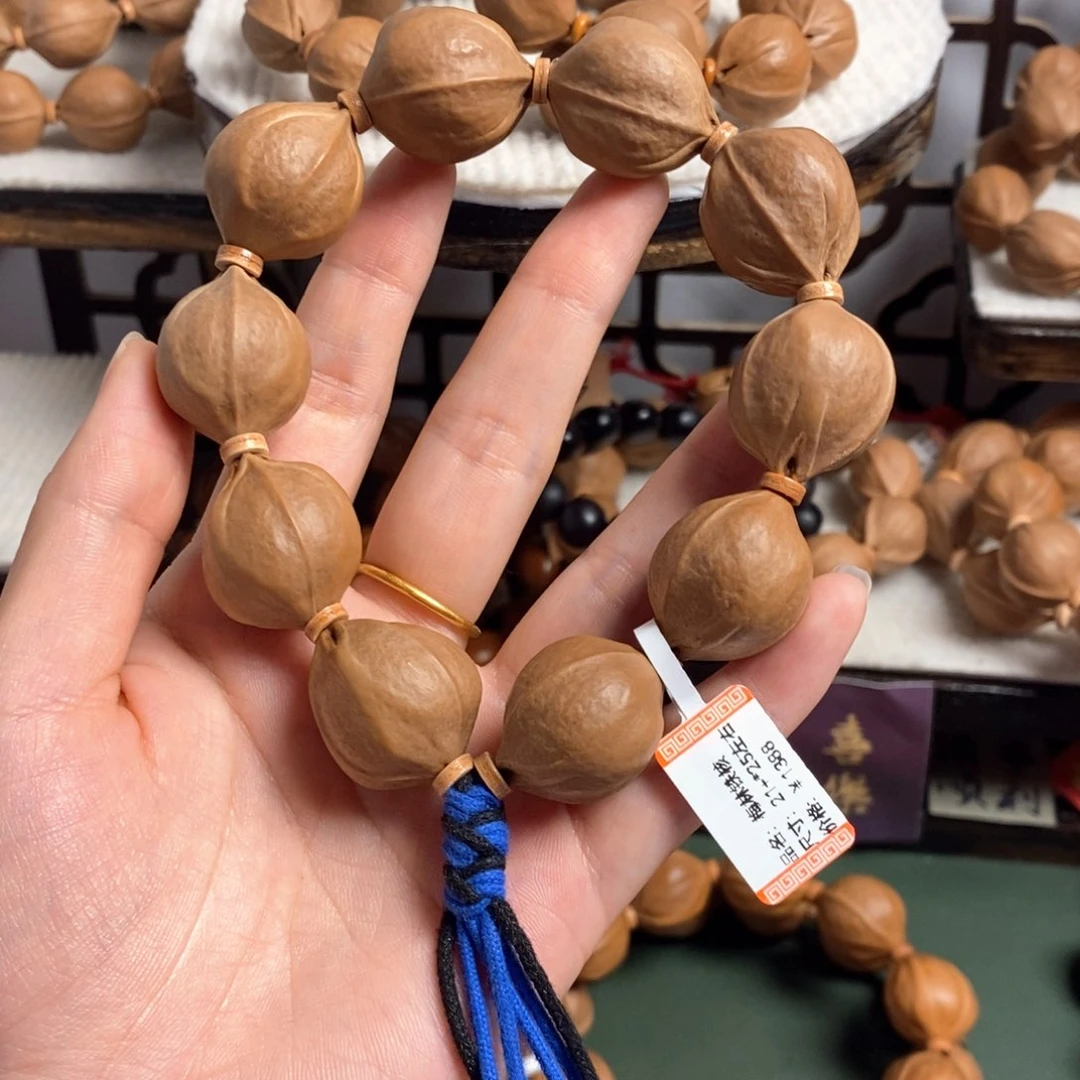 橄榄核手串/手链陳*梅林铁21/25左右