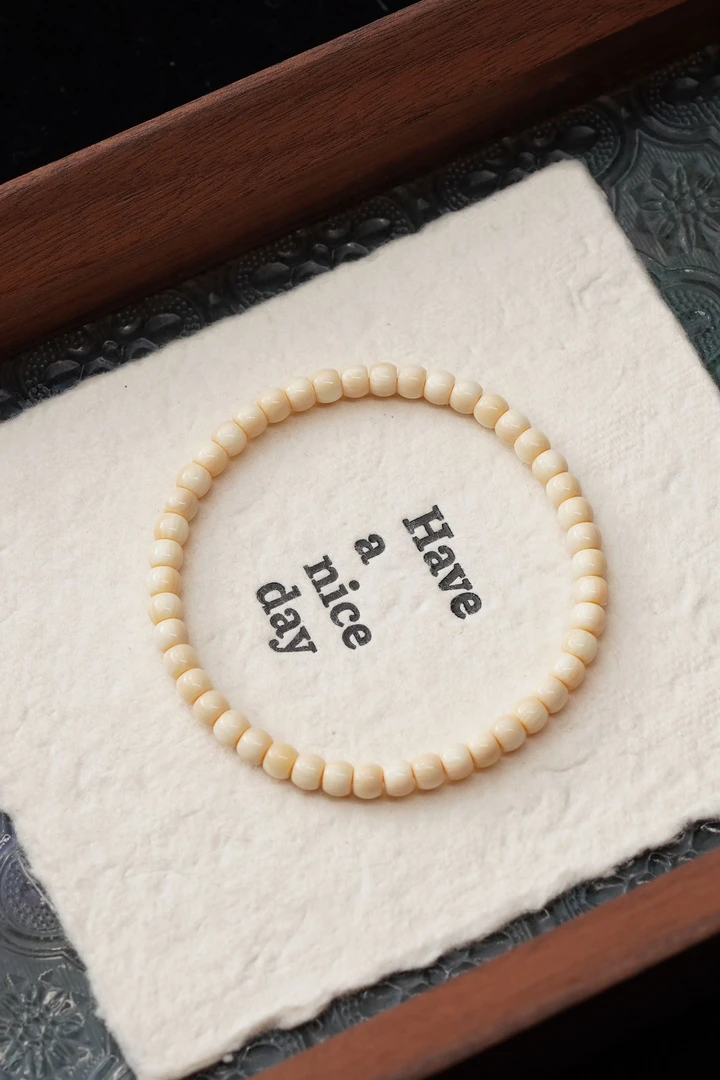 油饼饼 天然猛犸牙飘咖料4*5mm直切单圈手串