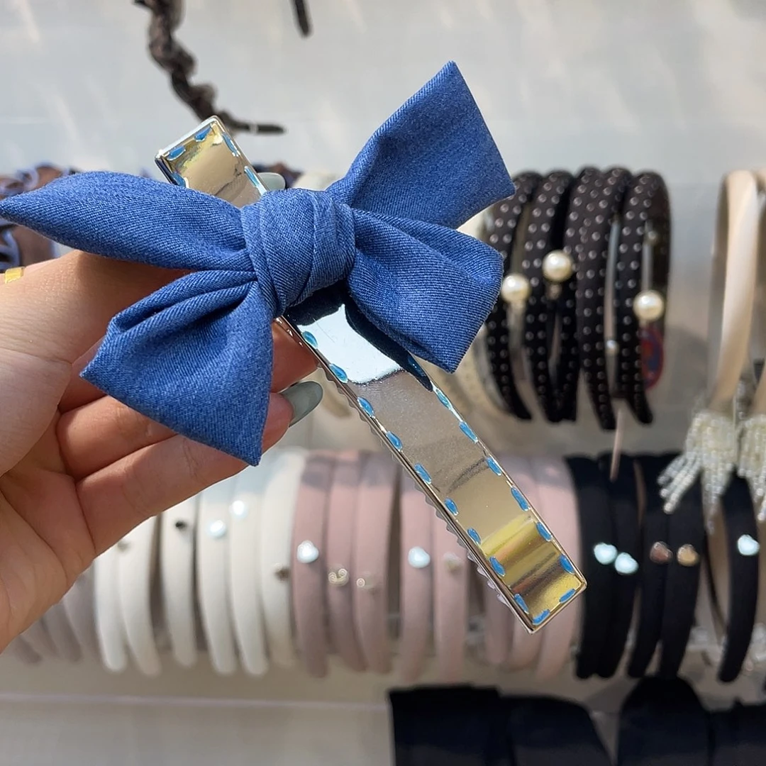 树脂非金属牛仔蝴蝶结懒人夹