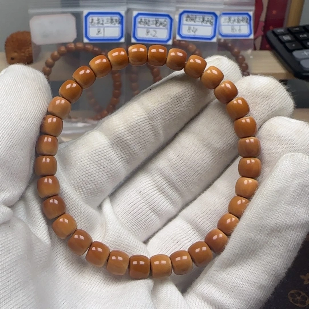 手串橄榄核老挝单圈极限弧三花无白7.1mm