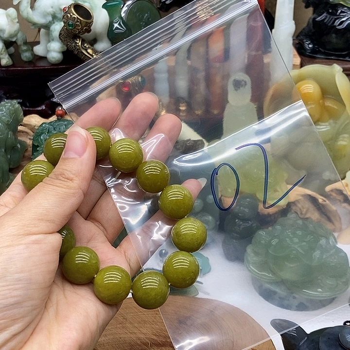 岫玉未镶嵌手把件