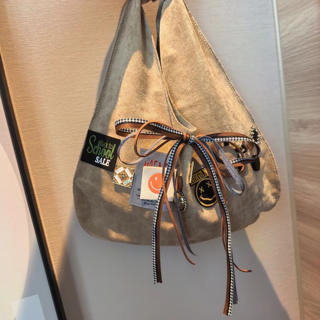 BB328咖色蝴蝶结飘带笑脸绒绒手拎包包