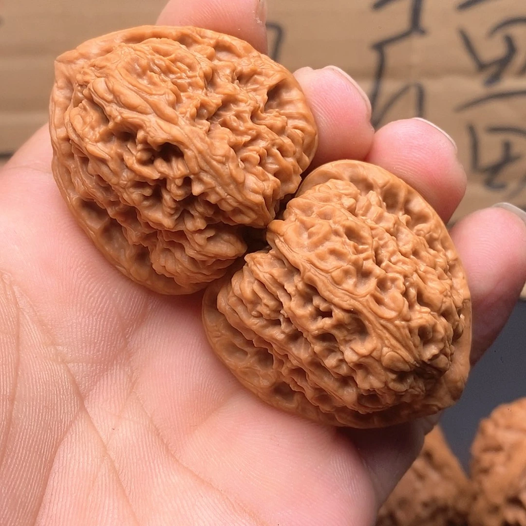 老***K把件文玩核桃三角疆……