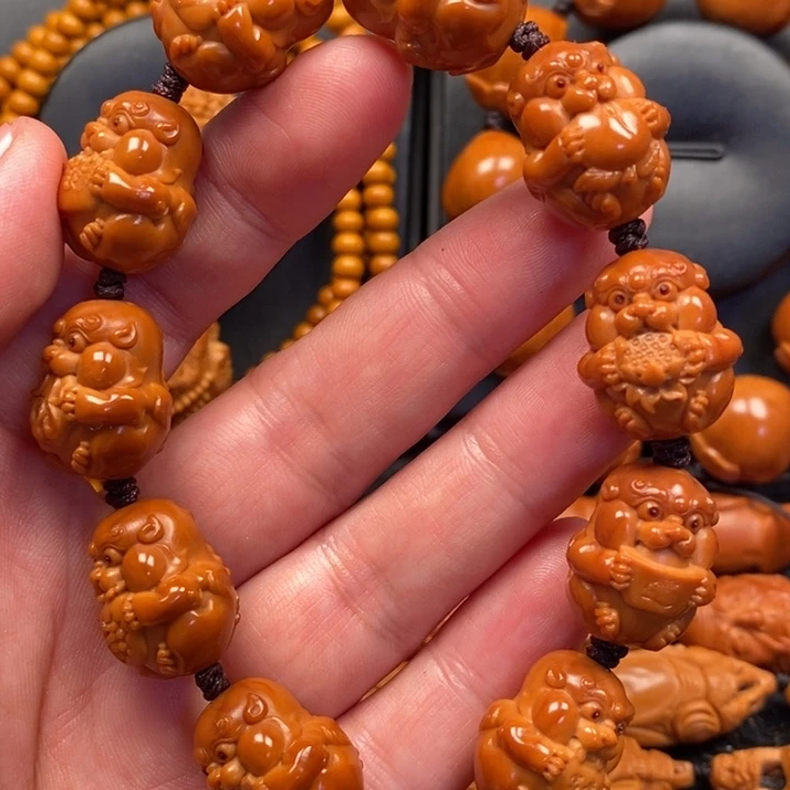 手串橄榄核吞金兽