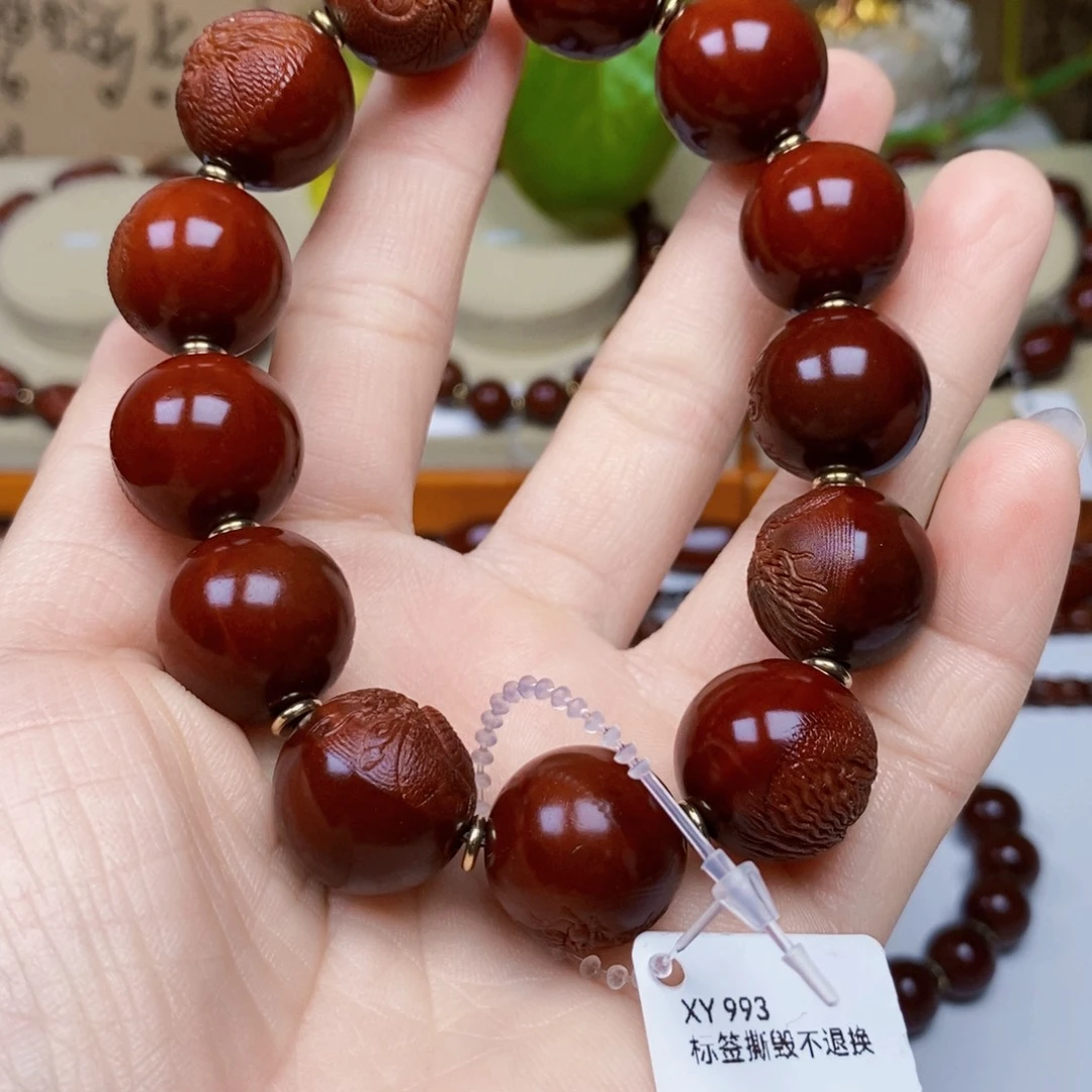 老***锅橄榄核吊坠包浆玉化
