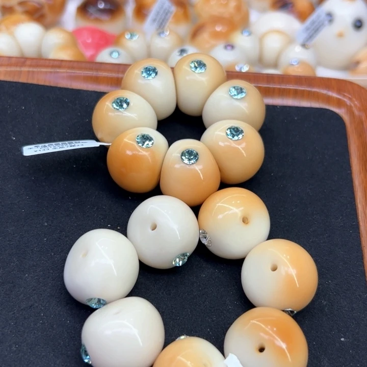 白玉菩提把件T****娜72 象牙果原果雕刻镶钻大肠14颗
