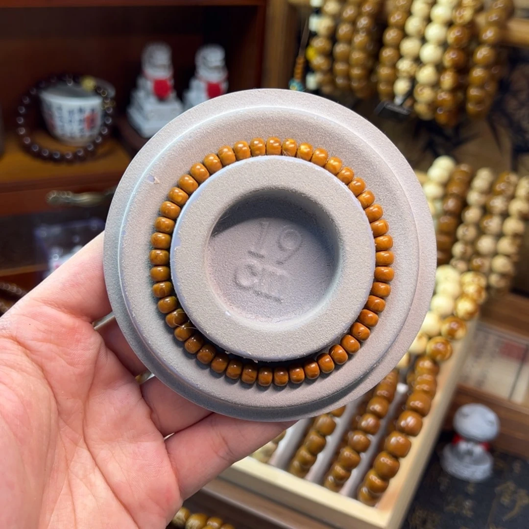 非金属紫金鼠6.3*4.5纯肉黄皮墩墩珠精品