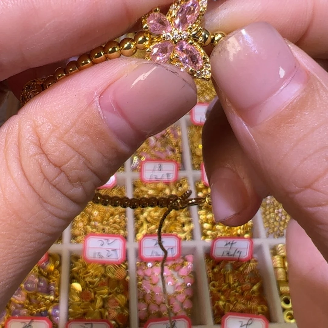 合金粉色带告蝴蝶1个