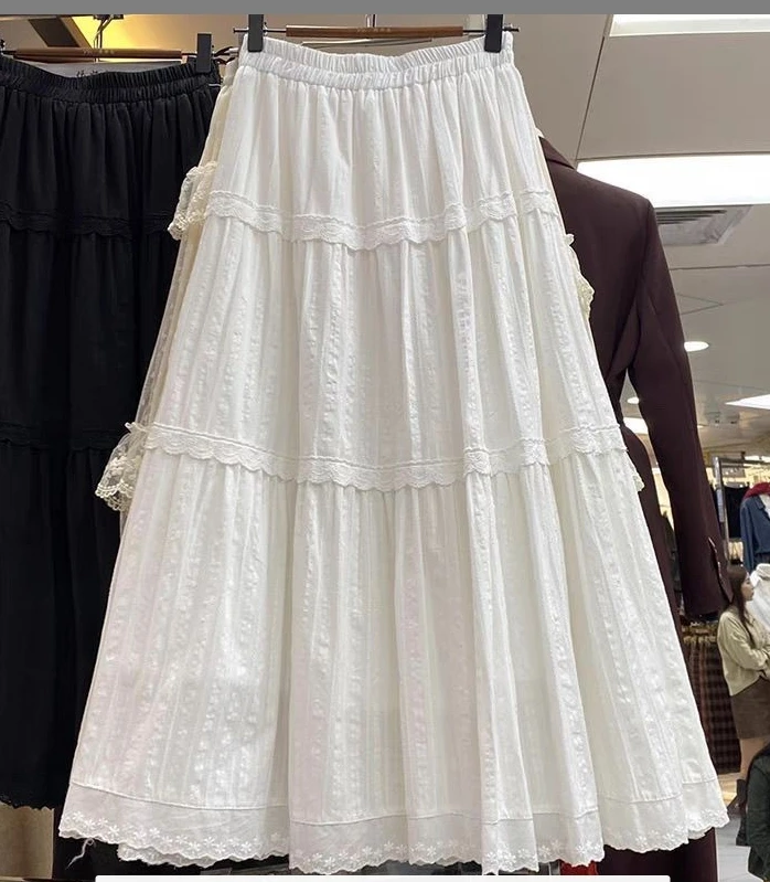 棉蛋糕刺绣花边拼接半身裙女2025春夏新款法式小众A字白色长裙子