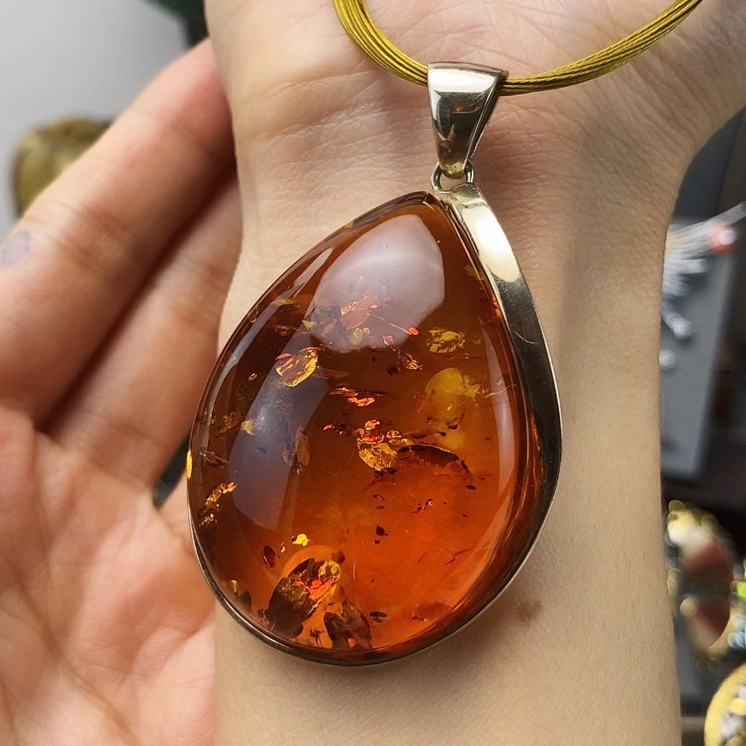 银S925镶嵌琥珀裸石吊坠