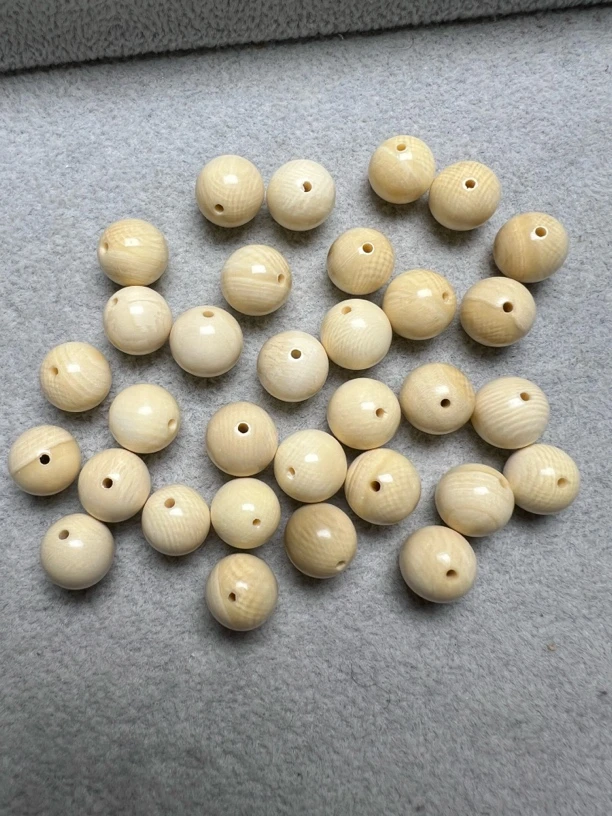 猛犸牙，瑕疵10mm圆珠散珠，有皮，有色差