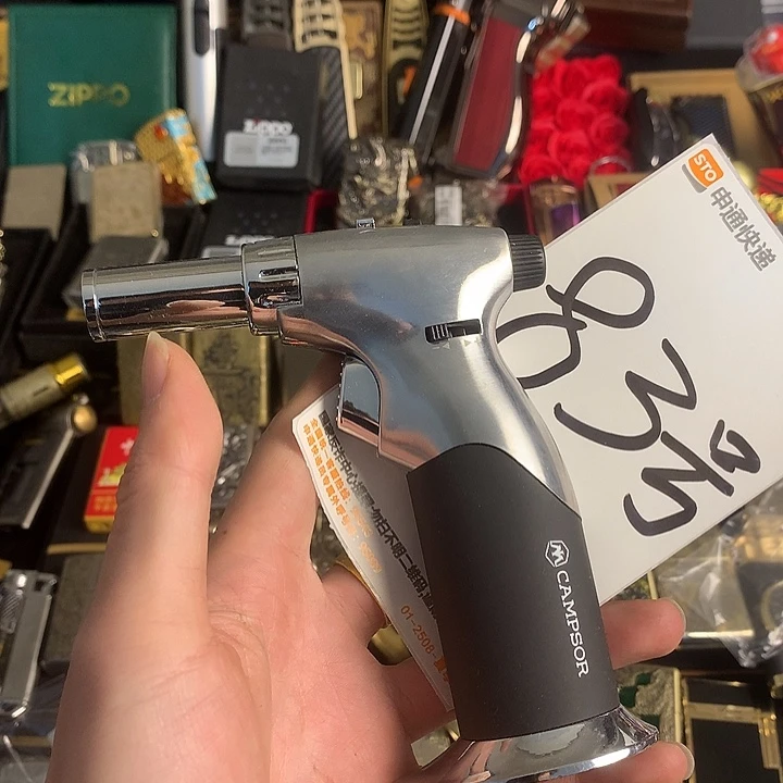 君***683号喷号打火机一个